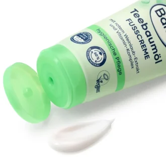 Smooth white cream texture of Tea Tree Oil Foot Care