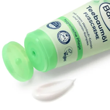 Smooth white cream texture of Tea Tree Oil Foot Care