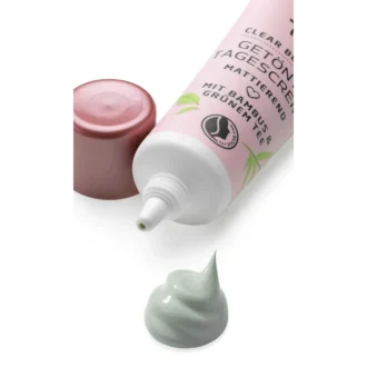Close-up of alverde BB cream adapting to beige tone on skin