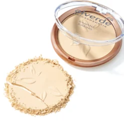 Open alverde Banana Baking Powder showing fine yellow powder texture on white surface.