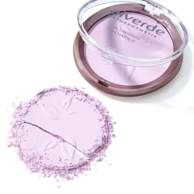 Close-up detail of fine violet powder texture from alverde NATURKOSMETIK Blurring Powder.