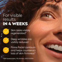 Close-up of smiling woman with radiant skin, showcasing Nivea Q10 anti-wrinkle rich day cream benefits: visible results in 4 weeks, reduced deep wrinkles, firmer facial contours