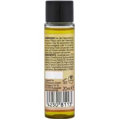 Back label of ISANA Professional Argan Oil & Care Hair Oil, 20 ml, with ingredient and application information