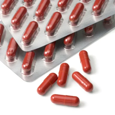 Mivolis Eye Extra supplement detail highlighting 25 mg lutein, 1.25 mg zeaxanthin and vitamins for normal vision
