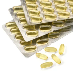 Mivolis Omega 3 softgel capsules close up texture fish oil capsules