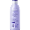 Back of NIVEA Pampering Soft Body Milk 400 ml showing ingredients and product information