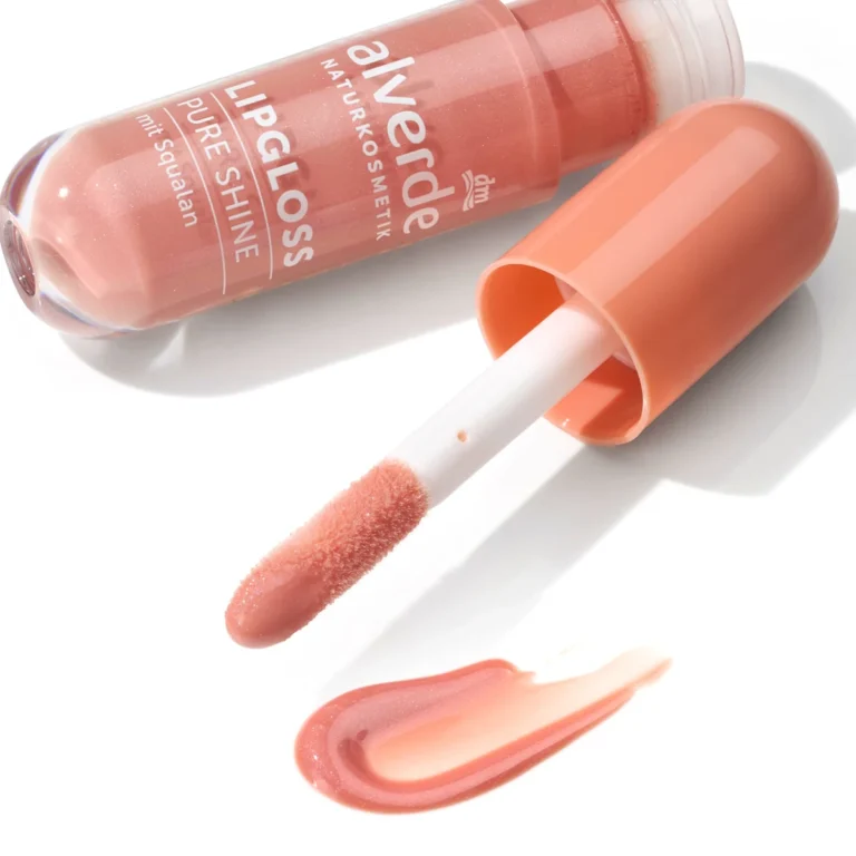 Close-up of alverde Pure Shine Lip Gloss 30 Peach Glow showing its peach-nude color and glossy finish
